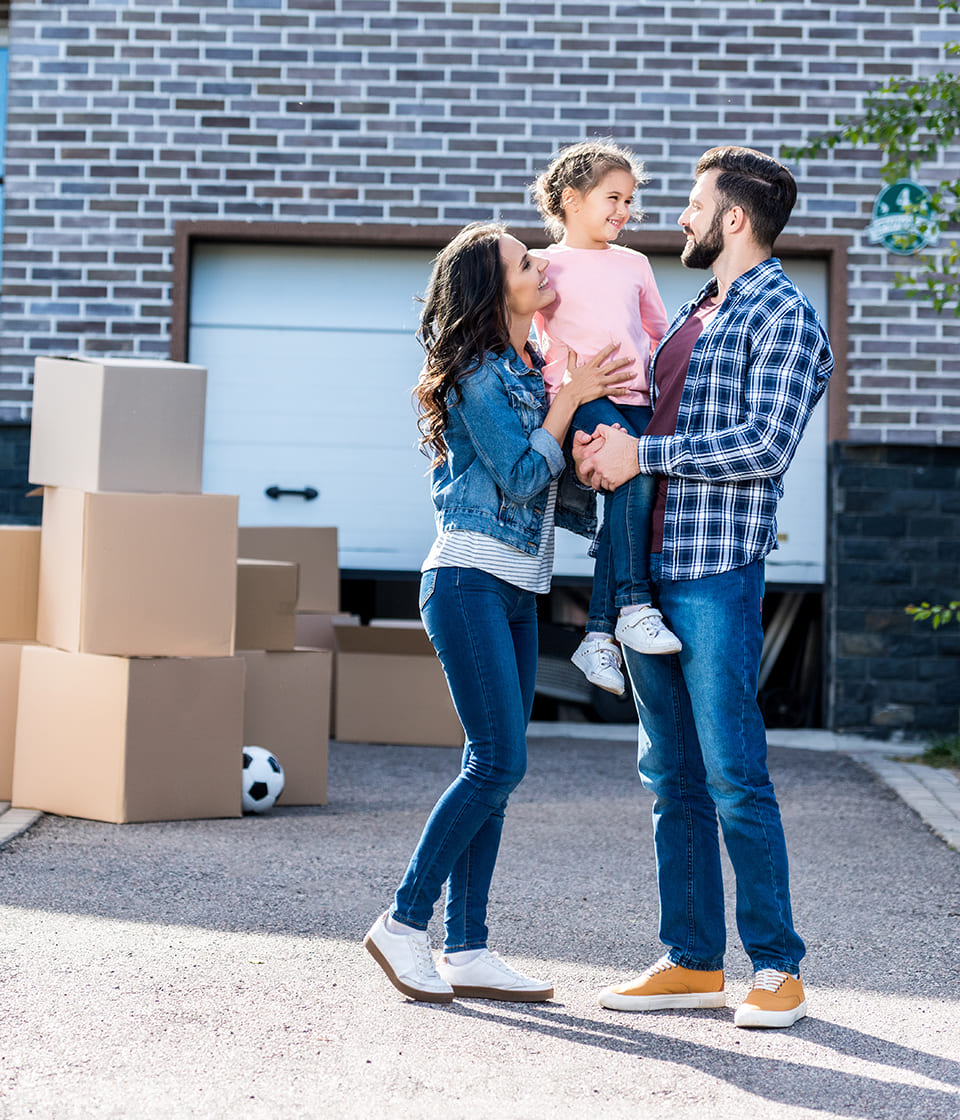 Couple receiving keys to their new home
